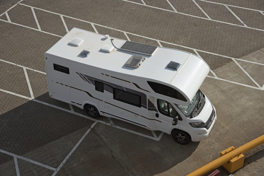 Overview of a black and white motorhome