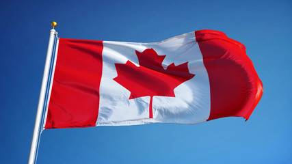 Canada flag waving against clean blue sky, close up, isolated with clipping mask alpha channel transparency, perfect for film, news, digital composition