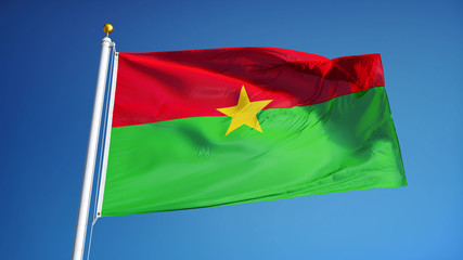 Fototapeta premium Burkina Faso flag waving against clean blue sky, close up, isolated with clipping mask alpha channel transparency, perfect for film, news, digital composition