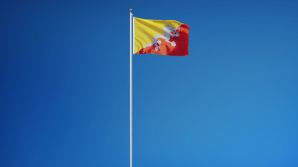 Bhutan flag waving against clean blue sky, long shot, isolated with clipping mask alpha channel transparency, perfect for film, news, digital composition