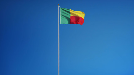 Benin flag waving against clean blue sky, long shot, isolated with clipping mask alpha channel transparency, perfect for film, news, digital composition
