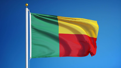 Benin flag waving against clean blue sky, close up, isolated with clipping mask alpha channel transparency, perfect for film, news, digital composition