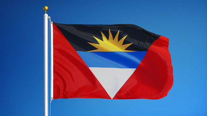 Naklejka premium Antigua and Barbuda flag waving against clean blue sky, close up, isolated with clipping mask alpha channel transparency, perfect for film, news, digital composition
