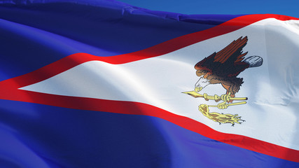 American Samoa flag waving against clean blue sky, close up, isolated with clipping mask alpha channel transparency, perfect for film, news, digital composition