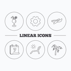 Airplane, deck chair and cocktail icons.