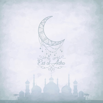 Arabic Islamic calligraphy of text Eid-Ul-Adha with mosque silho