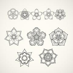 Collection of design elements. Black flower icons isolated on wh