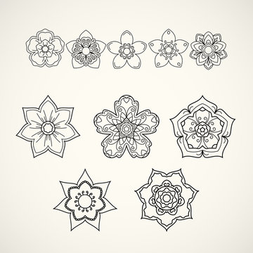 Collection of design elements. Black flower icons isolated on wh