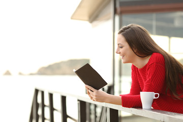 Woman reading an ebook on holidays