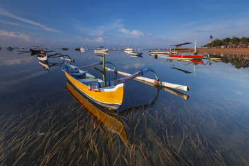 Traditional balinese jukung fishing boats on Sanur beach, Bali, Indonesia, Asean