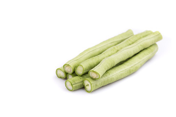 Close up cut green lentils isolated on white