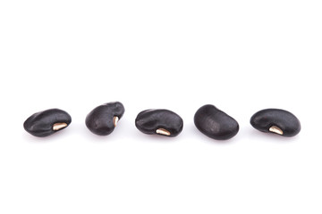Fototapeta na wymiar Close up black beans isolated on white