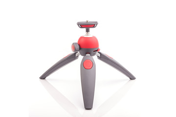 Fototapeta premium Mini tripod for camera isolated on white background