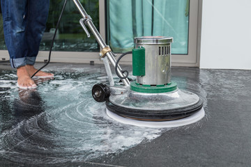 Exterior stone floor cleaning with polishing machine and chemica