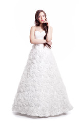 Fototapeta na wymiar Portrait of beautiful young brunette woman bride in white Wedding dress