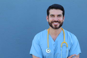 Portrait of friendly male doctor smiling with space for copy or text 