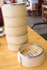stack of bamboo dimsum basket on blur background