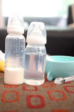 Baby bottle with milk and water