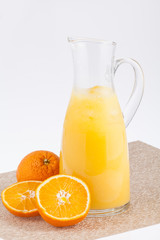 Orange and orange juice isolated on white