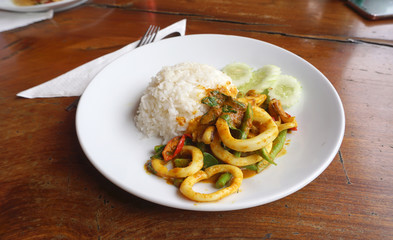 Spicy stir fried squid with yellow chilli paste with rice