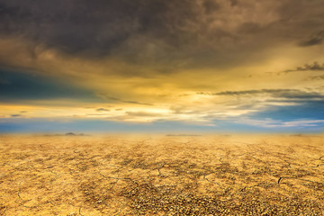 Empty land during sunset with clouds