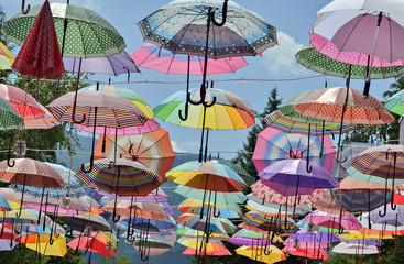 Fototapeta na wymiar Many hanging umbrellas