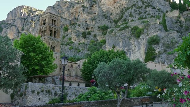 View of Moustiers Sainte Marie, famous village in southern France. Beautiful typical French town with monuments and tourist attractions. Travel, holiday in Europe
