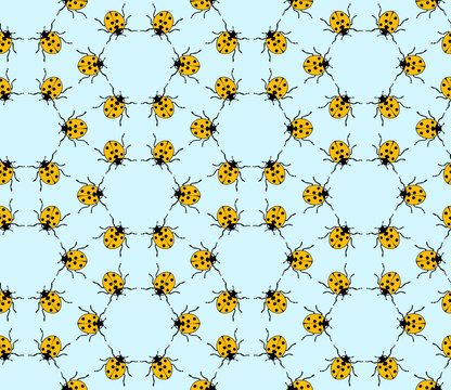 seamless pattern made from ladybugs on blue background