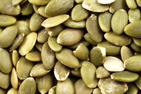 A super macro image of roasted pumpkin seeds