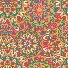 Seamless background with circular symmetrical mandalas.