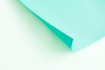 Green and blue paper background.