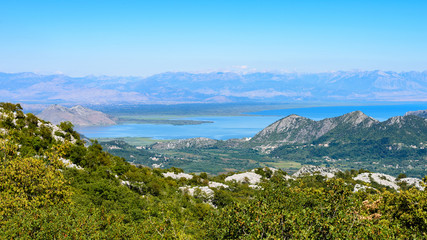 The landscape of Lake Skadar to the mountain on a sunny day.