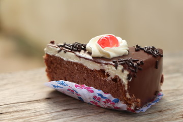One piece of chocolate cake with jelly.