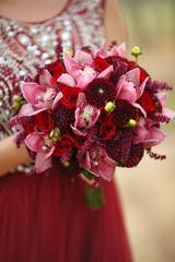 Beautiful wedding flowers bouquet marsala color peony roses orchids