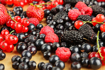 Berries on wooden background