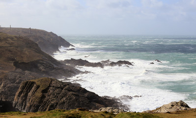 Fototapeta na wymiar The coast south of Pendeen Watch on a stormy day, Cornwall, England, UK.