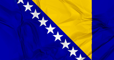 The national Bosnia waving flag in 3d background.