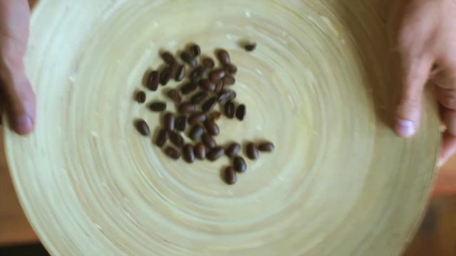 Coffee beans on a table made of bamboo