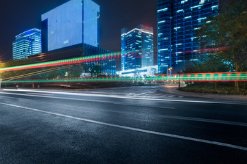 empty asphalt road with cityscape and skyline of Shanghai