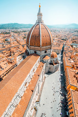 Top cityscape view on the dome of Santa Maria del Fiore church and old town in Florence
