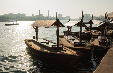 Naklejka na ściany i meble Traditional Abra ferries at the creek in Dubai, United Arab Emir