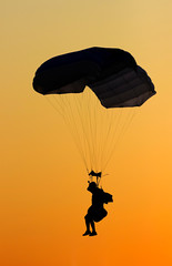 Paragliding - Para glider - Silhouette - Sunset