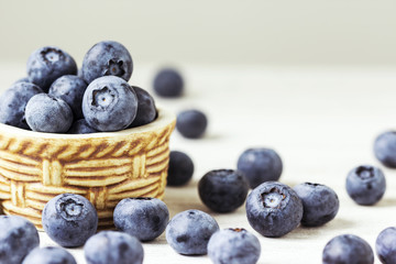 Fresh blueberries on the wooden table