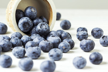 Fresh blueberries on the wooden table