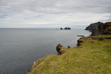 Fototapeta na wymiar View from Westman Islands cliff. Iceland. View from the cliff of Westman Islands, Iceland.