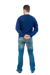 back view of Business man looks. Isolated over white background.