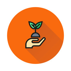 hands holding plant icon on round background