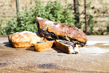 Strudel with poppy seeds on a Wooden Table
