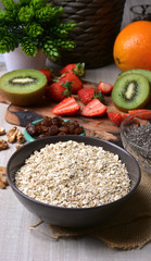 preparation of breakfast with flakes of oats
