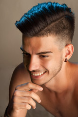 Close up portrait of a young man with modern hairstyle